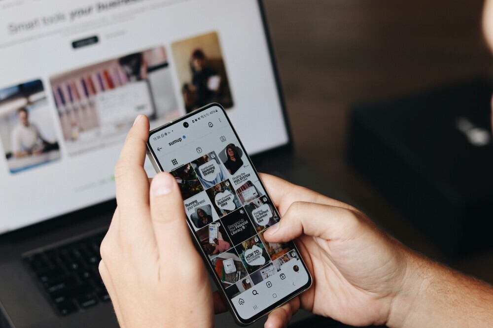 looking at a mobile phone on social media posts